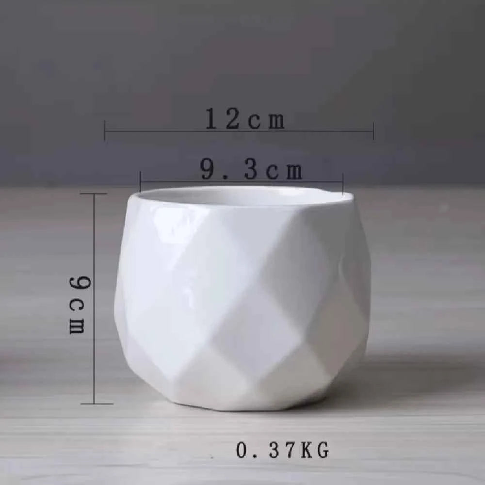 White geometric ceramic planter with size marks: 12 cm wide, 9.6 cm high, 0.37 kg