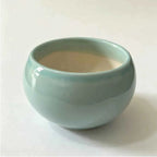 Teal bowl-shaped ceramic planter, 3.5 in, front view.